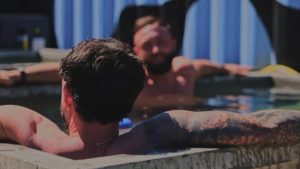 Men-relaxing-in-a-hot-tub